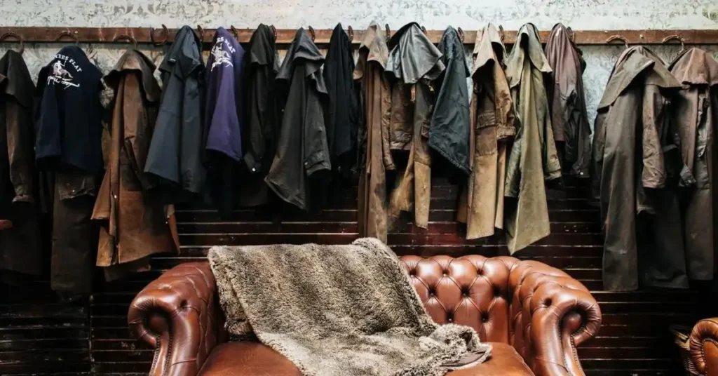 Mixing Vintage and Modern Fashion - Sofa with vintage clothes in the background