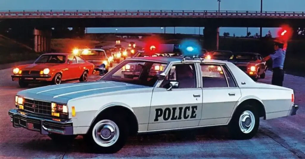 Vintage Police Car - Chevrolet Impala on a highway